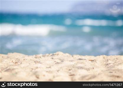 close up on white sand and sea waves travel background