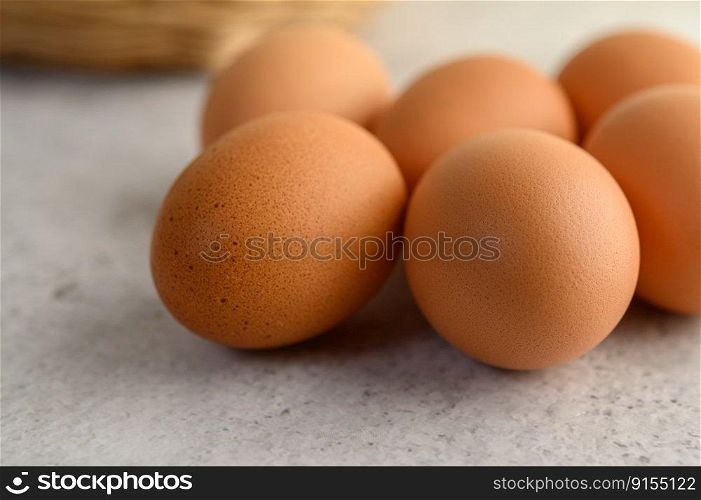 Close up Organic brown eggs several on the floor , preparing preparing for cooking food or dessert, copy space 