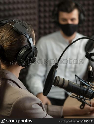 close up people wearing mask radio