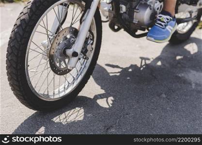 close up person riding motorcycle