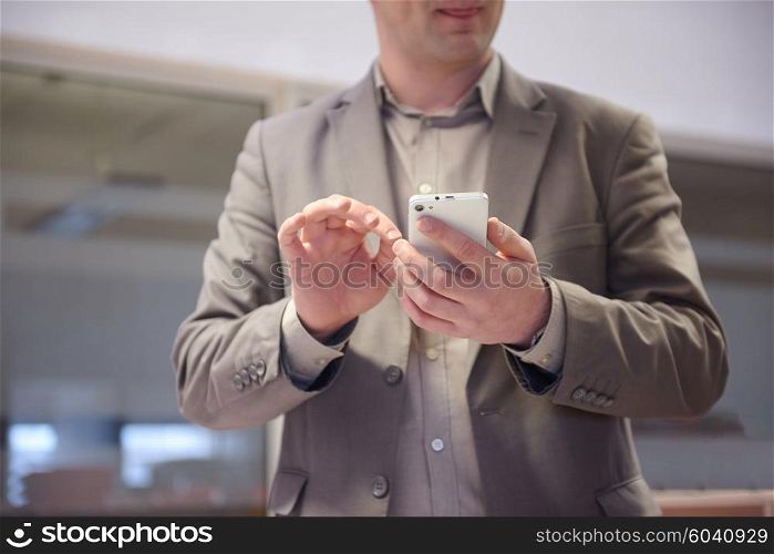 close up photo of business man work on phone at office