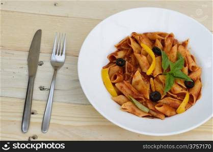 Close up photo of Pasta and spoon and fork