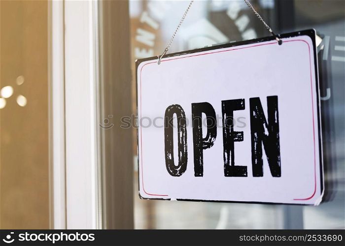 close up photo of signboard open on door on blur background. cafe, salon, restaurant ready to work. promotion business concept. High quality photo.. close up photo of signboard open on door on blur background. cafe, salon, restaurant ready to work. promotion business concept. High quality photo