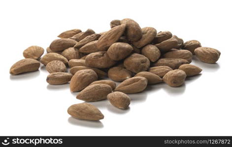 Close up photography of raw almonds heap over white background. Packshot style . Raw Almonds Over White Background. Packshot Style