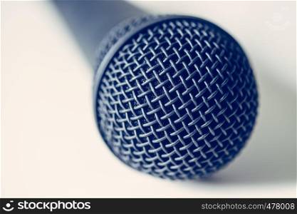 Close up picture of a black microphone
