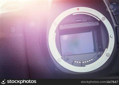 Close up picture of a camera sensor, professional reflex camera. Sunlight.