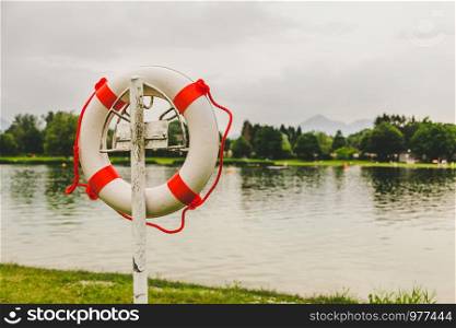 Close up picture of a safety buoy at a swimming lake, summer time