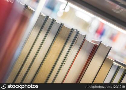 Close up picture of a variety of books in the public library.