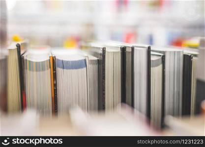Close up picture of a variety of books in the public library.