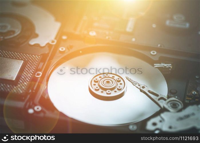 Close up picture of computer hard drive, used in cloud computing. Sunlight.