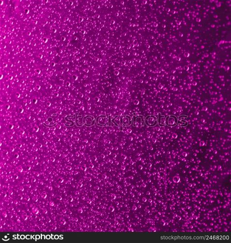 close up pink abstract water drops background
