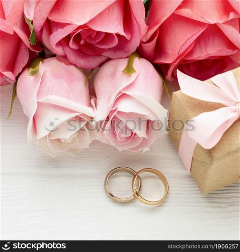 close up pink roses wedding rings. High resolution photo. close up pink roses wedding rings. High quality photo