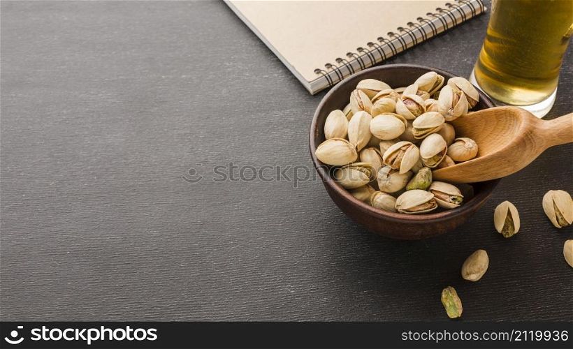 close up pistachio with beer