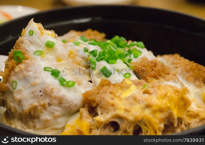 close up pork cutlet , vegetable and egg on rice , japanese Katsudon