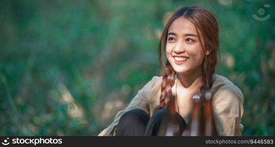 Close up Portrait beautiful Asian women traveler is relaxing at front of c&ing with friend, They enjoy to talking and drinking beer with fun and happy together