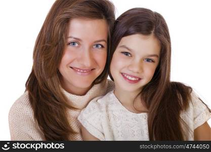 Close up portrait of a beautiful ten year old little girl and happy mother, isolated on white background