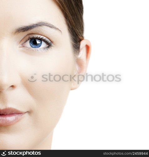 Close-up portrait of a beautiful young woman isolated on white background