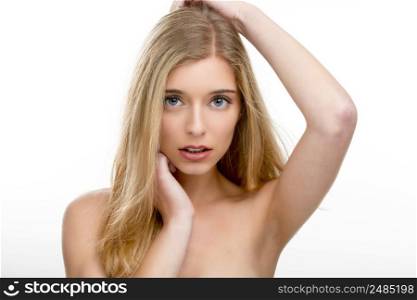 Close-up portrait of a beautiful young woman, isolated over white background
