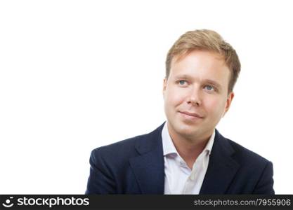 Close-up portrait of a dreamy young businessman staring in the distance. Handsome blond man with blue eyes in suit isolated on white background