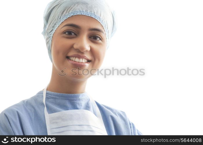 Close-up portrait of a happy female surgeon isolated over white background