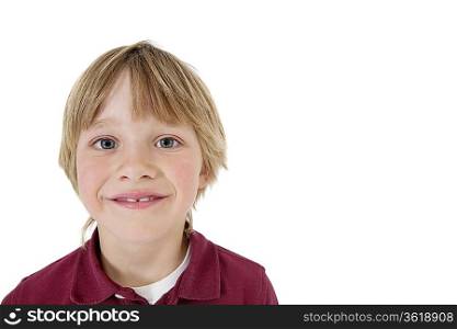 Close-up portrait of a happy school boy over white background