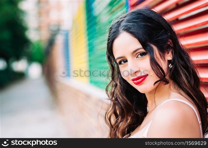 Close up portrait of a smiling girl looking at camera