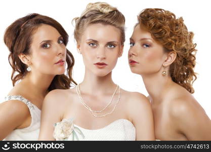 Close Up, Portrait of a three beautiful woman in wedding dress isolated over white background