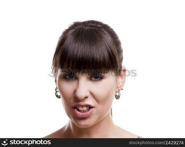 Close-up portrait of a woman with a funny expreession, isolated on white background