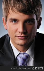 Close-up portrait of a young businessman