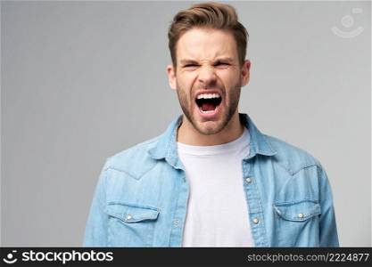 Close-up portrait of Angry man screaming or shouting.. Close-up portrait of Angry man screaming or shouting