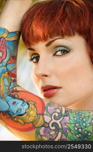 Close up portrait of attractive tattooed Caucasian woman in Maui, Hawaii, USA.