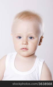 Close-up portrait of baby boy (1-2), studio shot