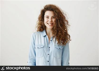 Close-up portrait of beautiful tender brunette woman looking , isolated on grey background.. Close-up portrait of beautiful tender brunette woman looking , isolated on grey background
