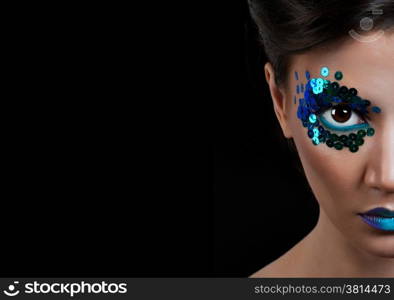 Close-up portrait of beautiful woman with professional make-up Fashion Model Girl. black background