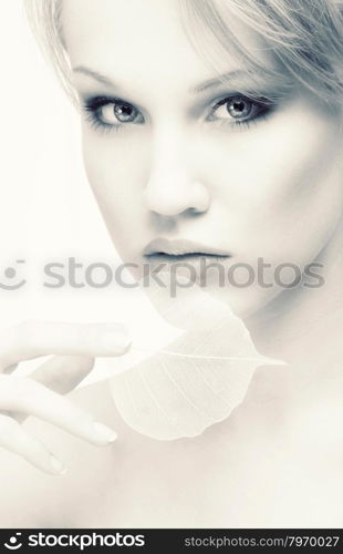 Close-up Portrait of Beautiful Young Woman looking at Camera