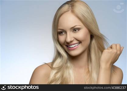 close-up portrait of beauty smiling girl with natural style, perfect skin and smooth blonde hair