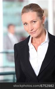Close-up portrait of blond businesswoman
