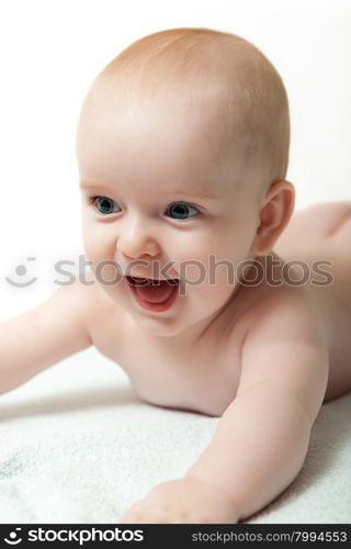 close up portrait of blue eyed baby boy isolated on white background