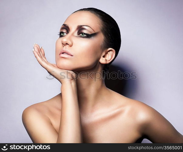 close up portrait of brunette woman with perfect skin