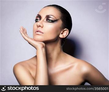 close up portrait of brunette woman with perfect skin