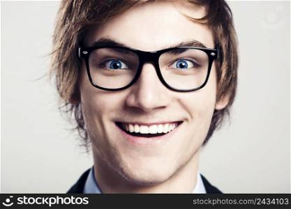 Close-up portrait of business man wearing nerd glasses