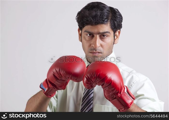 Close-up portrait of businessman wearing gloves