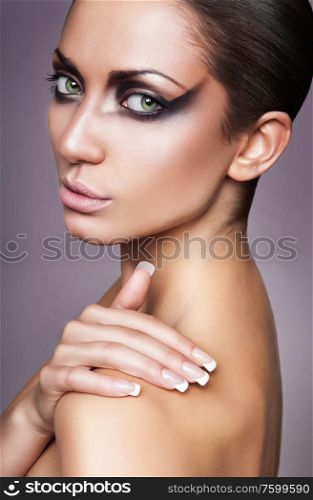 close up portrait of calm brunette woman with perfect skin