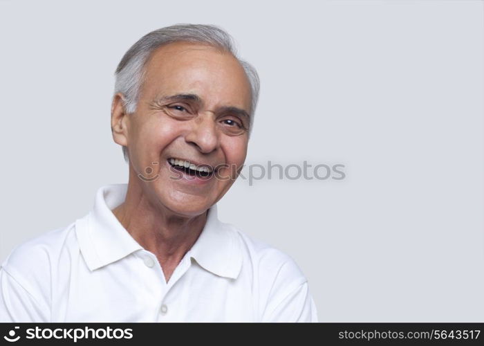 Close-up portrait of cheerful man