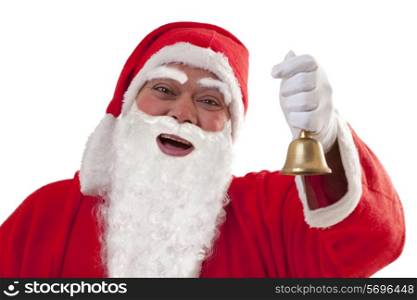 Close up portrait of cheerful Santa Claus ringing bell over white background