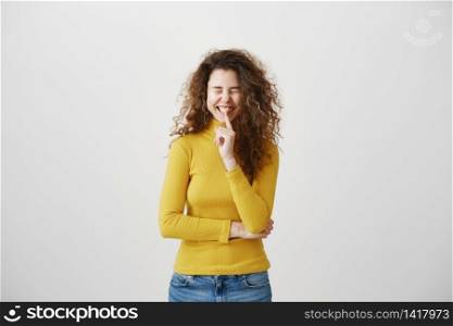Close up portrait of cute lovely attractive uncertain unsure with entrepreneur making hush gesture isolated on gray background copy-space.. Close up portrait of cute lovely attractive uncertain unsure with entrepreneur making hush gesture isolated on gray background copy-space