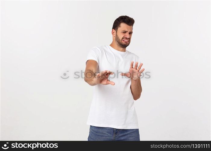 Close up portrait of disappointed stressed bearded young man in shirt over white background. Close up portrait of disappointed stressed bearded young man in shirt over white background.
