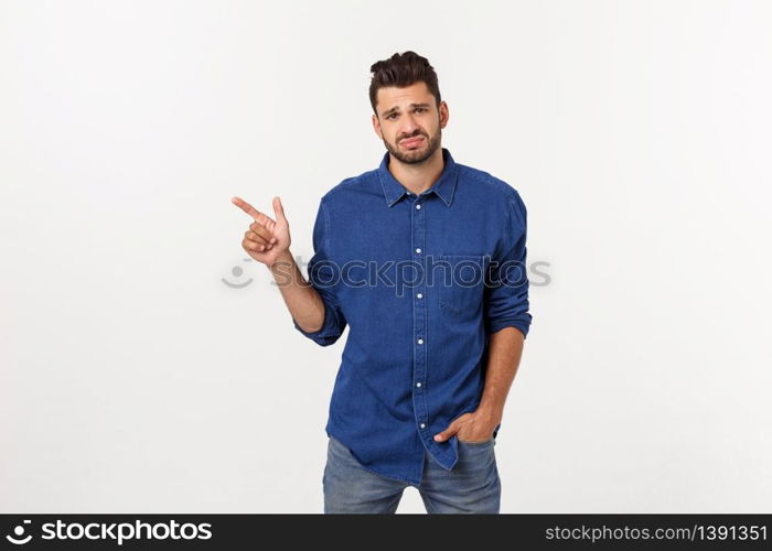 Close up portrait of disappointed stressed bearded young man in shirt over white background. Close up portrait of disappointed stressed bearded young man in shirt over white background.