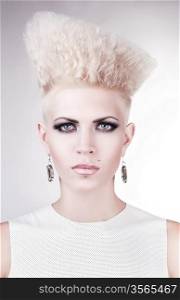 close up portrait of futuristic blond woman with creative hairstyle