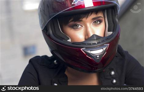 Close up Portrait of Girl in Red Full Face Helmet on Motorcycle